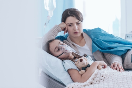 child receiving breathing treatment